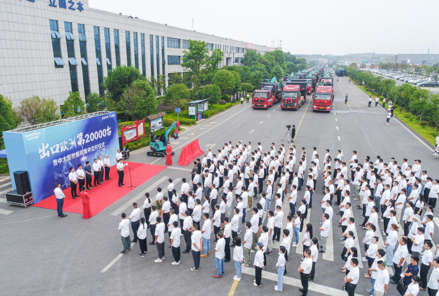 里程碑！UED在线官网网页版(中国)唯一官方网站智能出口欧洲第20000台暨大型挖掘机批量交付仪式成功举行